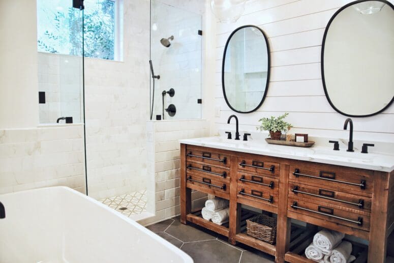 A bathroom with double sink vanities.