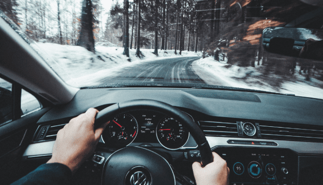 A person driving to meet a buyer's agent.