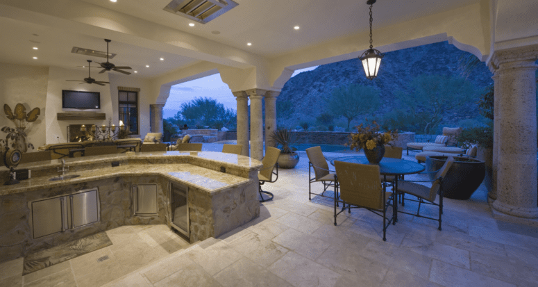 An outdoor kitchen that was added to a home.