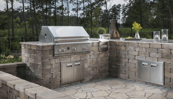 An outdoor kitchen made with stone.