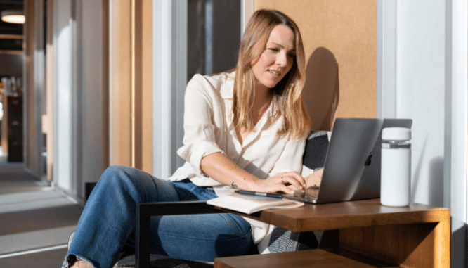 An agent using a computer to coordinate a million dollar rent to own home.