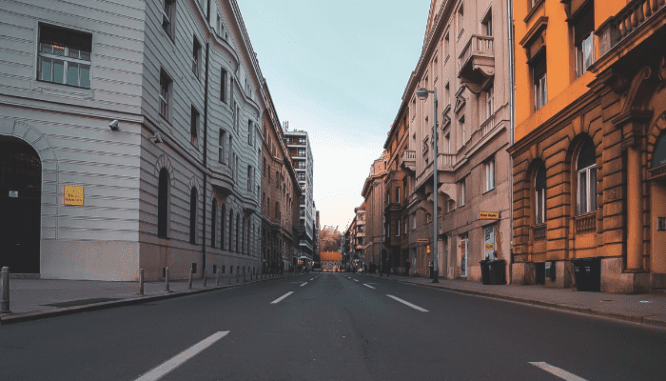 A view of a street near a million dollar home for rent.