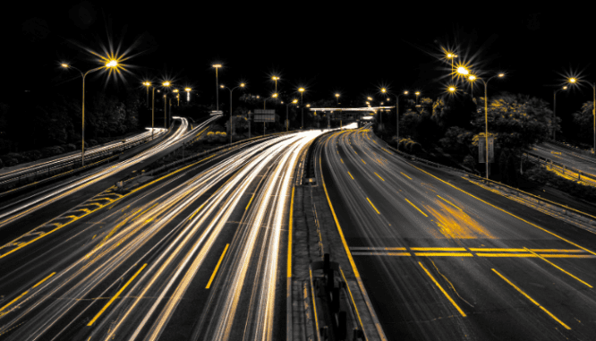 A highway leading toward a bedroom community.