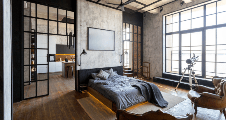 A loft apartment with a bed.