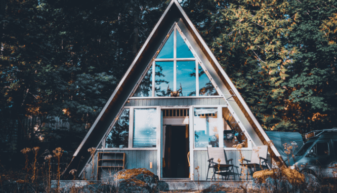 An image of the front of an A-frame house to depict what an A-frame house is.