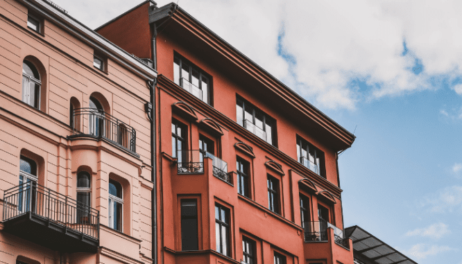 An apartment building that may have a penthouse.