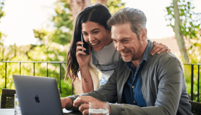 A couple checking house codes for their DIY project.