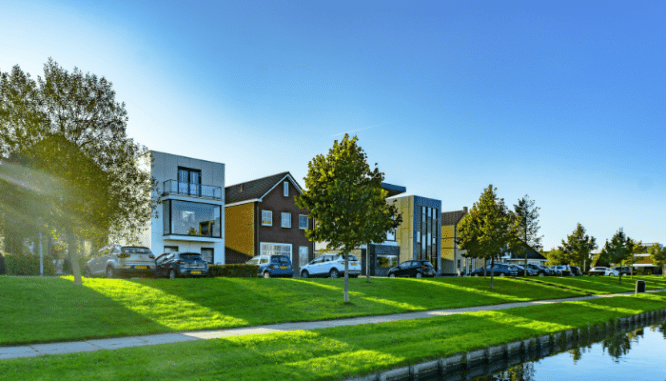 An image of colorful houses to demonstrate how to write a comparative market analysis.