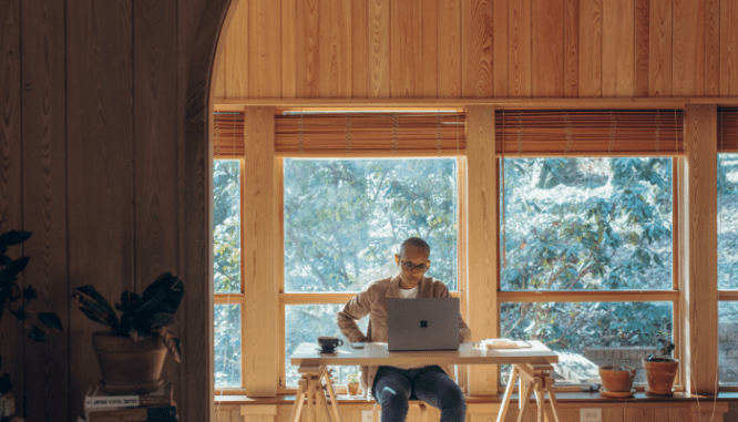 A homeowner researching sustainable design in a wood home.