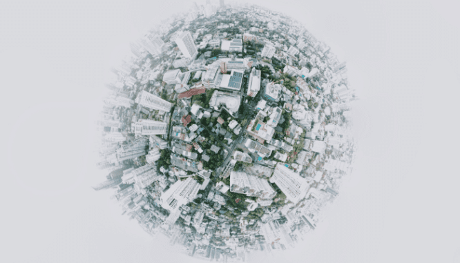 An aerial picture of homes in the shape of Earth.