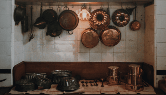 A kitchnem where you might find a salt box hanging, similar in style to saltbox homes.