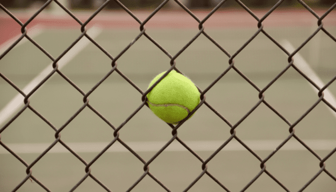 a tennis ball in a neighborhood with hoa dues.