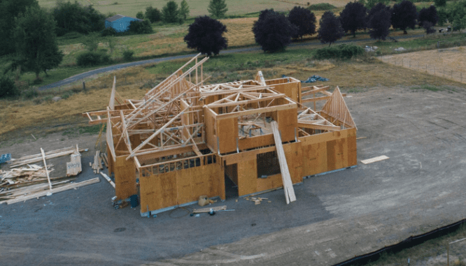 The framework of a new home, which is one of many steps to building a new house.