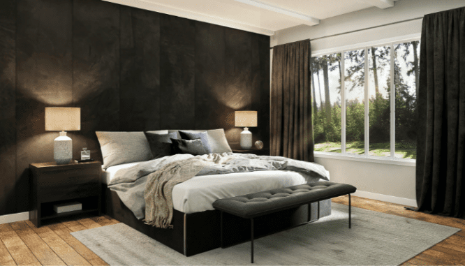 a bedroom, which has both natural light and heavy curtains, all part of your wellness design.