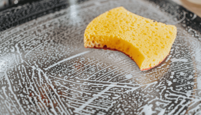 An image of a yellow sponge used to demonstrate a list of household items needed for a new home.