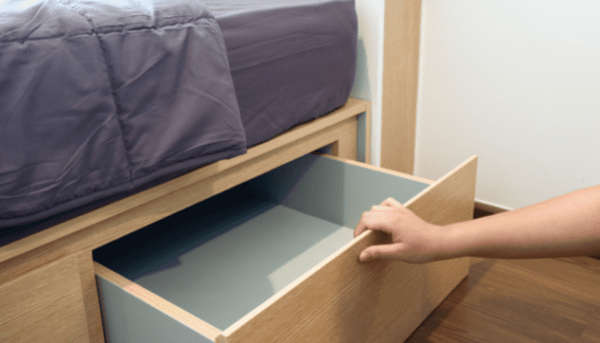 a bed with drawers, which can help you organize a small room.