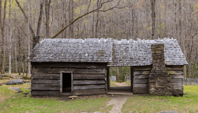 An old cabin that is designed as a dogtrot house.