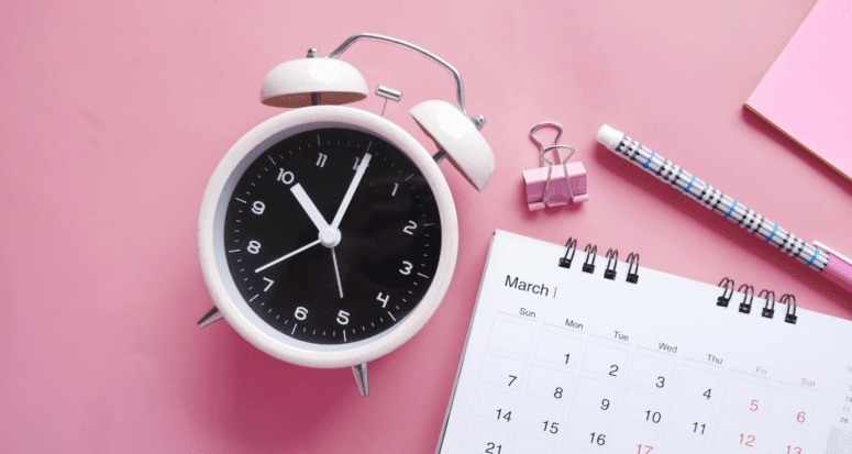 A clock and a calendar used when finding mortgage documents.