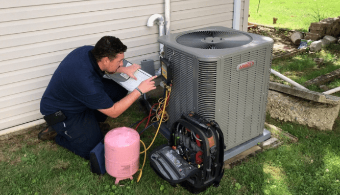 A professional assisting with an HVAC replacement.