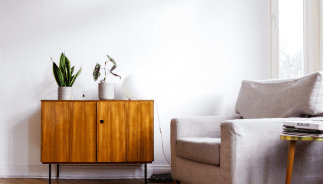 A neutral living room in a home that is for sale.