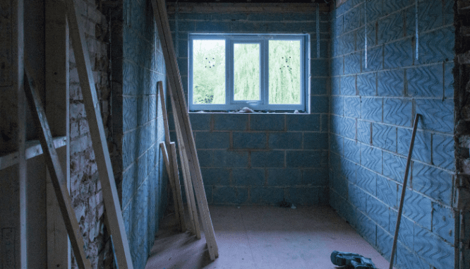 A room that is being renovated on a home improvement show.