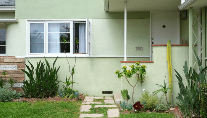 A yard in front of a house you can sell.