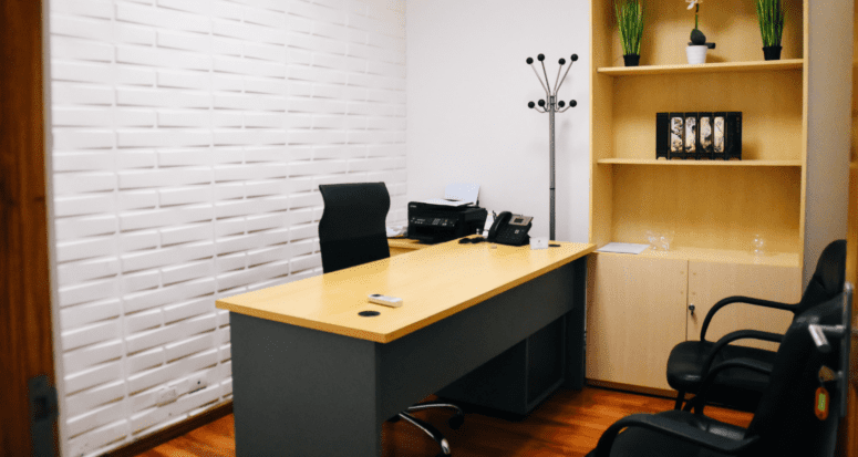 A desk used by a seller who is paying closing costs.