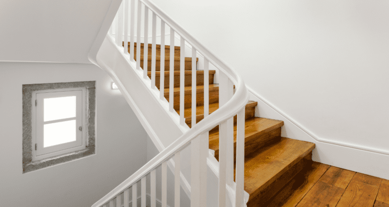 Stairs that have been remodeled from carpet to wood.