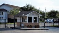 The front entrance into a gated housing community.