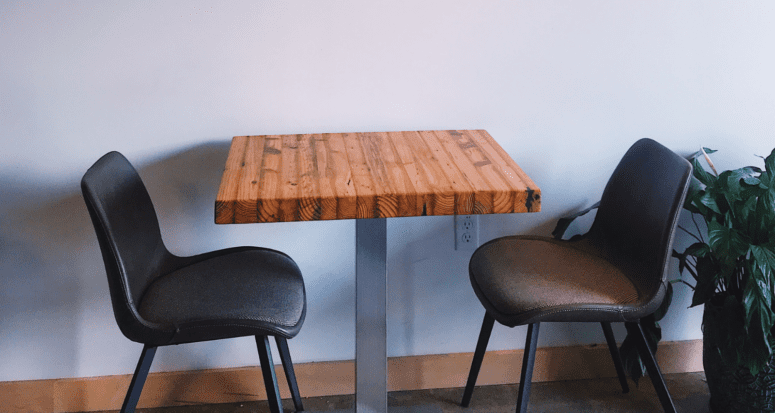 A table where a renter will sit to discuss buying a house.