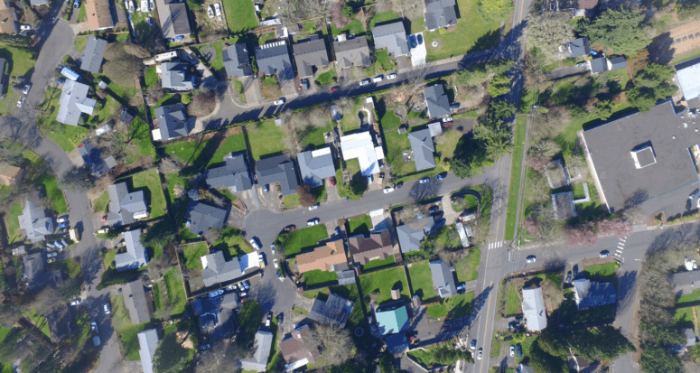 An aerial view of a neighborhood where a home might need an appraisal.