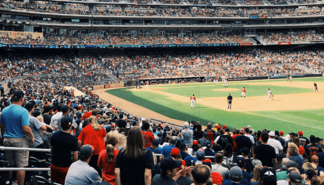 A baseball game, which you might be able to enjoy with city living.