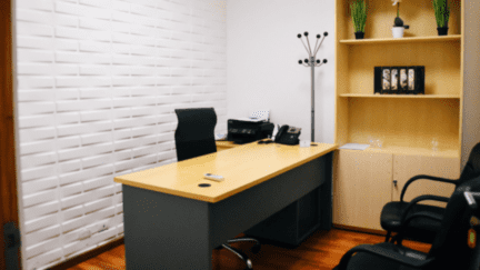 A desk used by a seller who is paying closing costs.