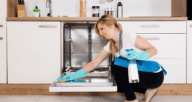 A woman using solution to deep clean a dishwasher.