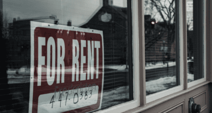 A for rent sign on a home that you might want to rent to own.