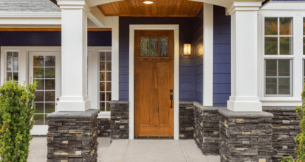 The front door of a home with smoke detectors that are required when selling a house