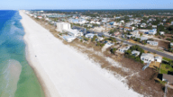 An aerial view of Panama City, FL where houses sell fast.