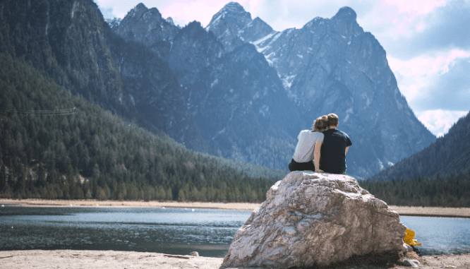 Two people discussing real estate companies in Colorado.