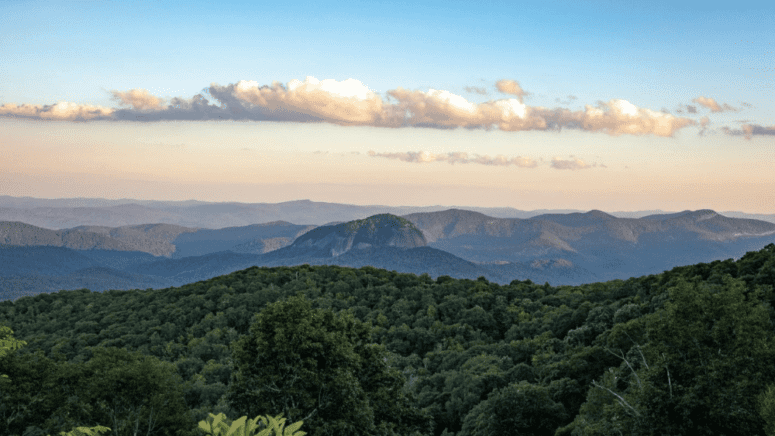 Mountains in North Carolina near a house sold as-is.