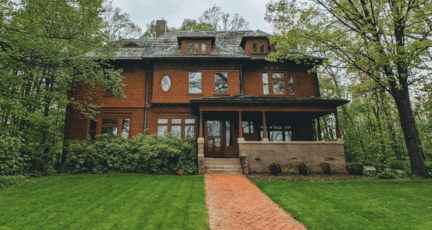 an older red house selling as is in wisconsin
