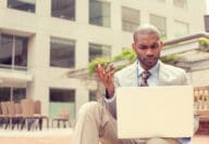 businessman looking at laptop