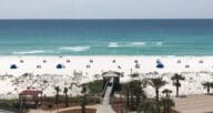 A beach in Florida near a new construction home.