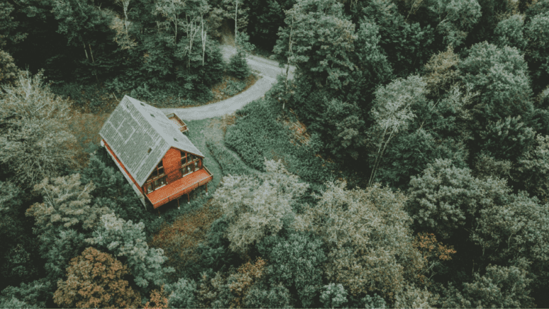 A cabin in the woods to demonstrate the process of finding real estate cash buyers.