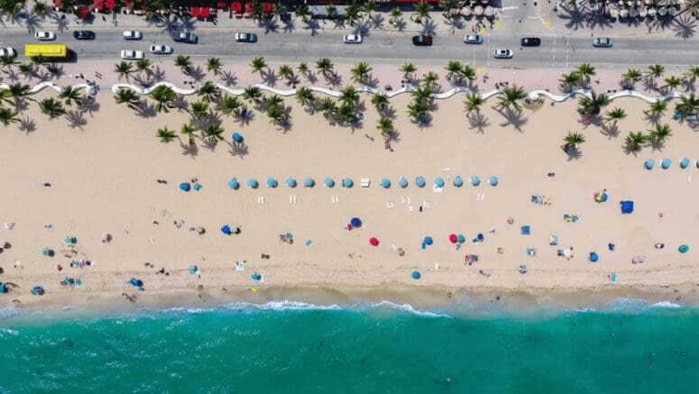 A beach in Pompano near a house you can buy.