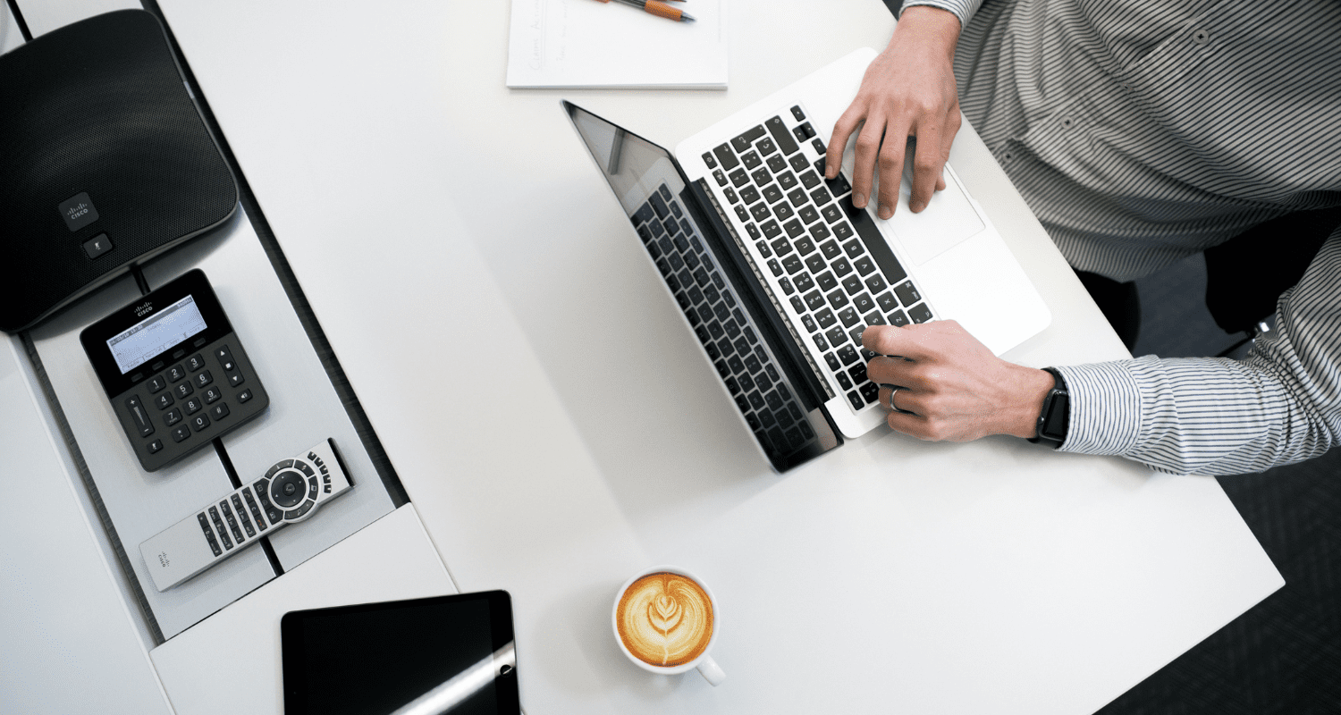 Image of individual using his laptop to search for top realtors