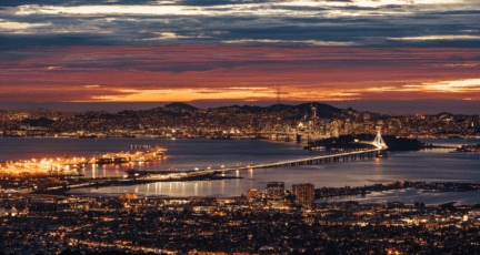 Night light city in Berkeley, CA where cash companies are located