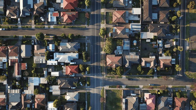 Aerial view of a neighborhood where home sellers may want to learn more about real estate listing fee