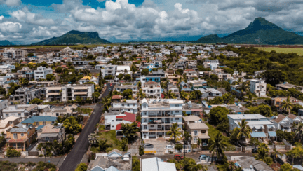 A neighborhood where there are a lot of cash offers for real estate.