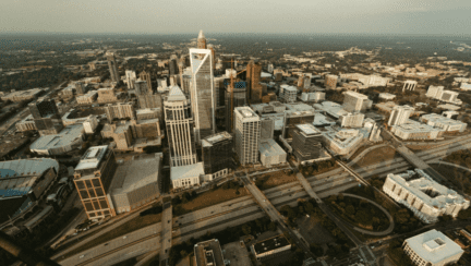 Aerial view of Charlotte NC where homeowners may be interested in utilizing the services of a we buy houses company