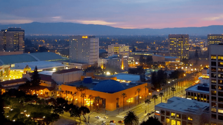 The San Jose skyline at night where a homeowner can sell a house fast in San Jose.